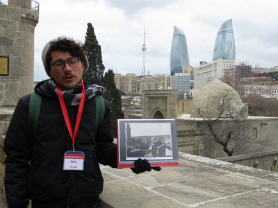 The view from the terrace of the Palace of the Shirvanshahs, capturing the development of Baku over the centuries. In the foreground is the Palace, built in the 15th century, in the middle Russian imperialist and Soviet architecture, and in the background the modern and iconic Flame Towers. Our guide is showing us an old photo of how the same view looked like when the Palace was just surrounded by a desert landscape.
