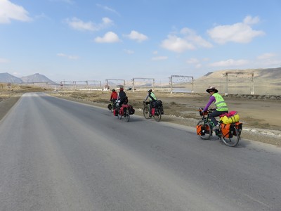 Our group cycling through the desert near Lökbatan, just outside Baku