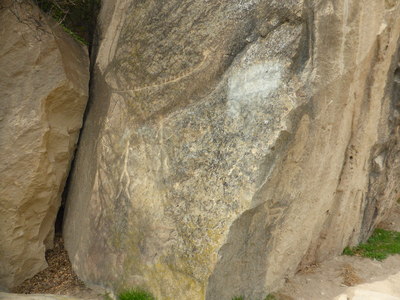 Rock carvings at Gobustan National Park showing a boat and hunters
