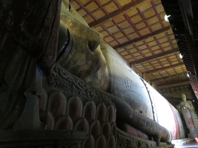 The largest clay-covered wood-core reclining Buddha statue in Asia inside the Giant Buddha Temple (大佛寺) in Zhangye