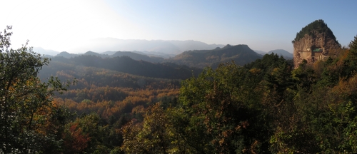 Maijishan (麦积山), which translates literally to "wheat stack mountain", rises suddenly out of the lush surroundings of the Qinling mountains and is quite the remarkable landform