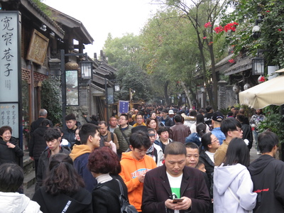 Kuanzhai Alley (宽窄巷子), or "Wide and Narrow Alley", three parallel lanes in Chengdu dating from the Qing dynasty with buildings reconstructed in old style. Full of teahouses, snack shops, and Sichuan opera places, the area is popular with locals and tourists alike and was packed like sardines when we visited on a Saturday!