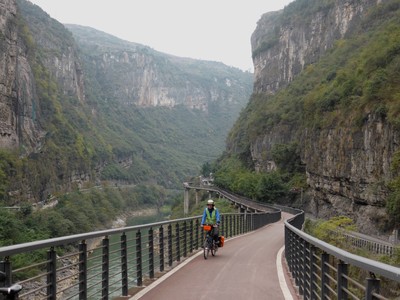 Cycling through an impressive karst landscape on the bicycle lane along the Chishui river between Xijiu and Meijiuhe