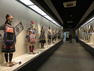 Clothing of the different ethnic groups that live in the Qiandongnan Miao and Dong Autonomous Prefecture, on display in the Kaili Ethnic Minorities Museum. It almost seems like each village has a different style of clothing, albeit with similar patterns and colours, and we couldn't really find clear commonalities within each ethnic group that differentiated them from the others (though we are sure that there are).