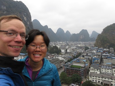 View of Yangshuo and the surrounding karst landscape from the top of a hill in Yangshuo Park