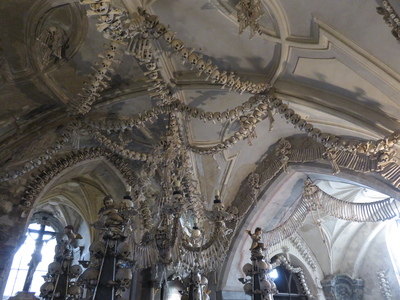 Sedlec Ossuary. This enormous chandelier of bones contains at least one of each bone of the human body.