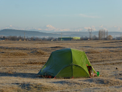 Our frozen tent with the Greater Caucasus mountains in the background