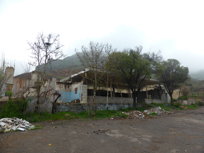 On our way up the valley from Rasht to Qazvin, we decided to camp in this abandoned building as there was heavy rain forecasted that evening and night. The place looked acceptable and we didn't see any better option, but after we had set up our tent and the sun had set, we realised that there was light coming out of a window that we had not noticed before. It turns out that there was a hidden room behind the wall on the left, that was padlocked from the outside. Our reclusive neighbour never came out and we were never discovered, but Heiko was a bit paranoid until we left the next morning.