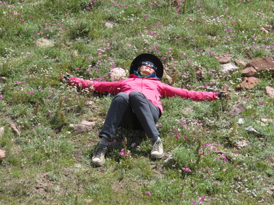 Enjoying the lush green grass after spending so much time in the high-altitude desert of the high Pamirs