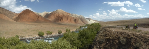 Red, colourfully-streaked mountains along the Kokomeren river between Suusamyr and Aral