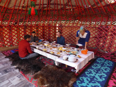Horse trekking to Song-Kul lake - inside the "dining yurt" of our yurt camp in Kelimche valley where we stayed for the night