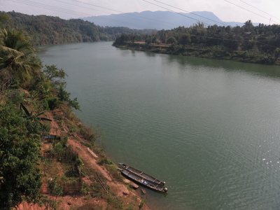 Nam Theun river, between Lak Sao and Ban Nahin, with boats made from fuel tanks jettisoned by US aircraft during the Vietnam War. Laos is the world's most heavily bombed country relative to its population, and people craft the metal from (unexploded!) bombs and fuel tanks into all sorts of items.