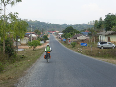 Heiko slowly cranking up the steep road just before Ban Nahin