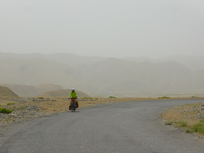 Climbing up the hazy mountains between Kulob and the Panj River