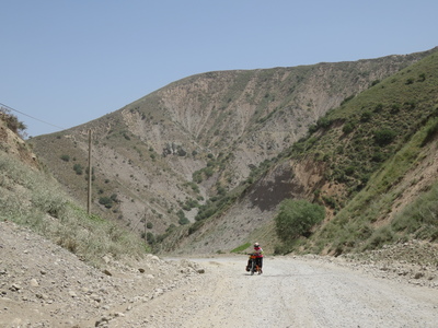 The road conditions near the top of the mountains between Kulob and the Panj River became increasingly poor, and we had to push our bicycles along some of the steeper bits