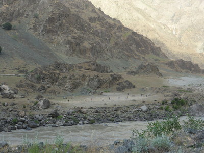 Football field in a village on the Afghan side of the Panj River