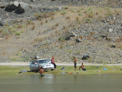 People swimming in some natural pools on the outskirts of Khorog, cooling off from the afternoon heat