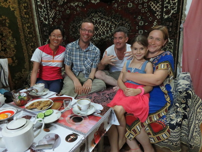 With the crazy ethnic Russian neighbours of our Couchsurfing host in Bayramaly. When we asked to borrow their mobile phone to contact our host, they invited us into their house and stuffed us with mashed potatoes, cake, tea and vodka.