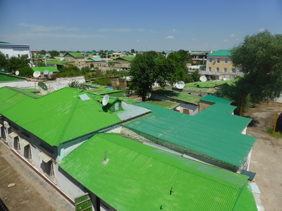 Roofs of Türkmenabat. White walls and green roofs appear to be the most popular colour combination for buildings in Turkmenistan.