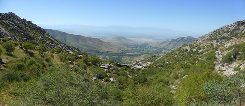 View down the valley towards Shahrisabz. Snow-capped mountains can be seen in the distance on the left.