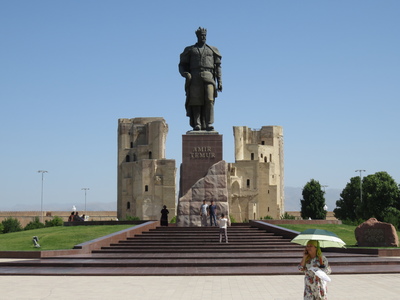 Statue of Amir Timur in Shahrisabz, in front of the remains of the grand entrance arch of the Ak Saray Palace. Shahrisabz is the birthplace of Amir Timur, founder of the Timurid Empire that ruled the region from 1370-1507.