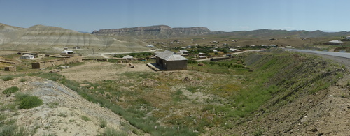 Okravot village nestled in between the impressive mountains, on our way up the Gissar mountain range from Guzar to Boysun