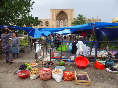 Vegetable market in front of the Said Atalyk Madrasah in Denov, from the 16th century